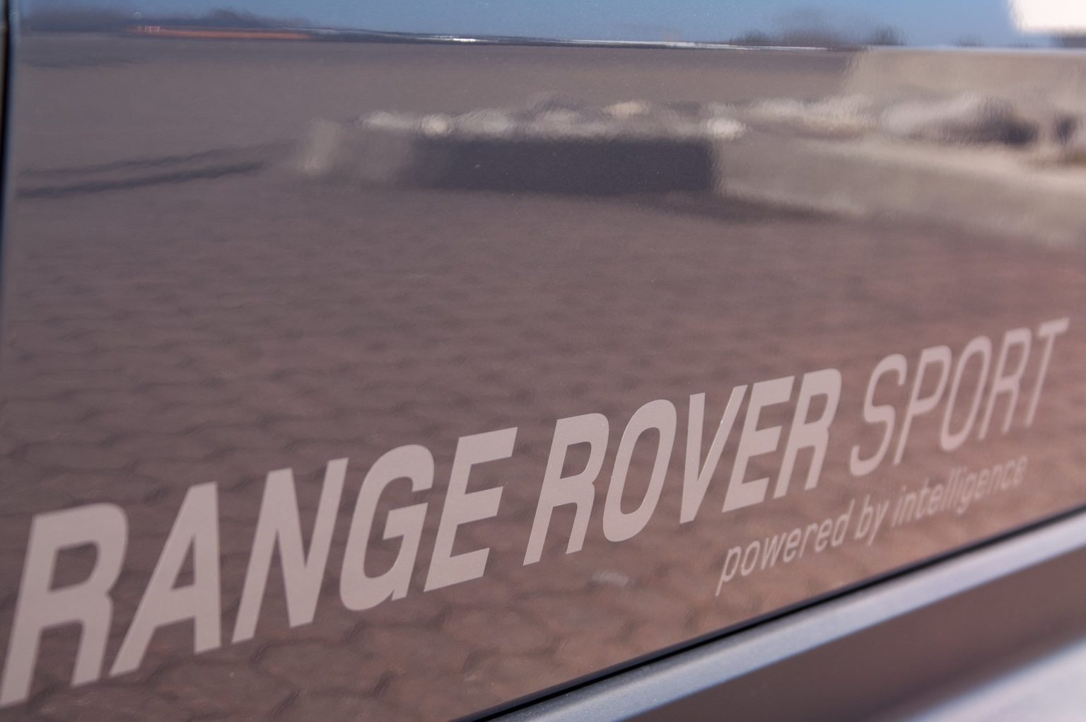 Autotuer Aufdruck Range Rover Sport powered by intelligence 1 bei Reisememo