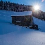 Schopf Winterlandschaft Sonnenstrahl bei Reisememo
